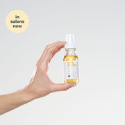 milk-shake-argan-oil-in-hand